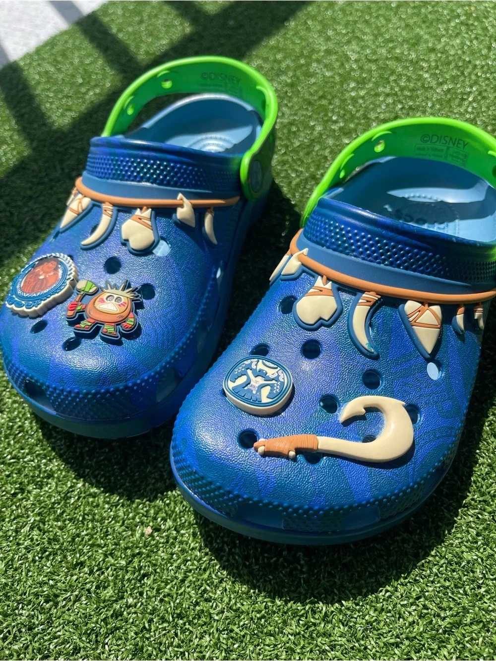 CROCS Moana Kids Blue Clog with Neon Green Strap and Ocean Charm Accents